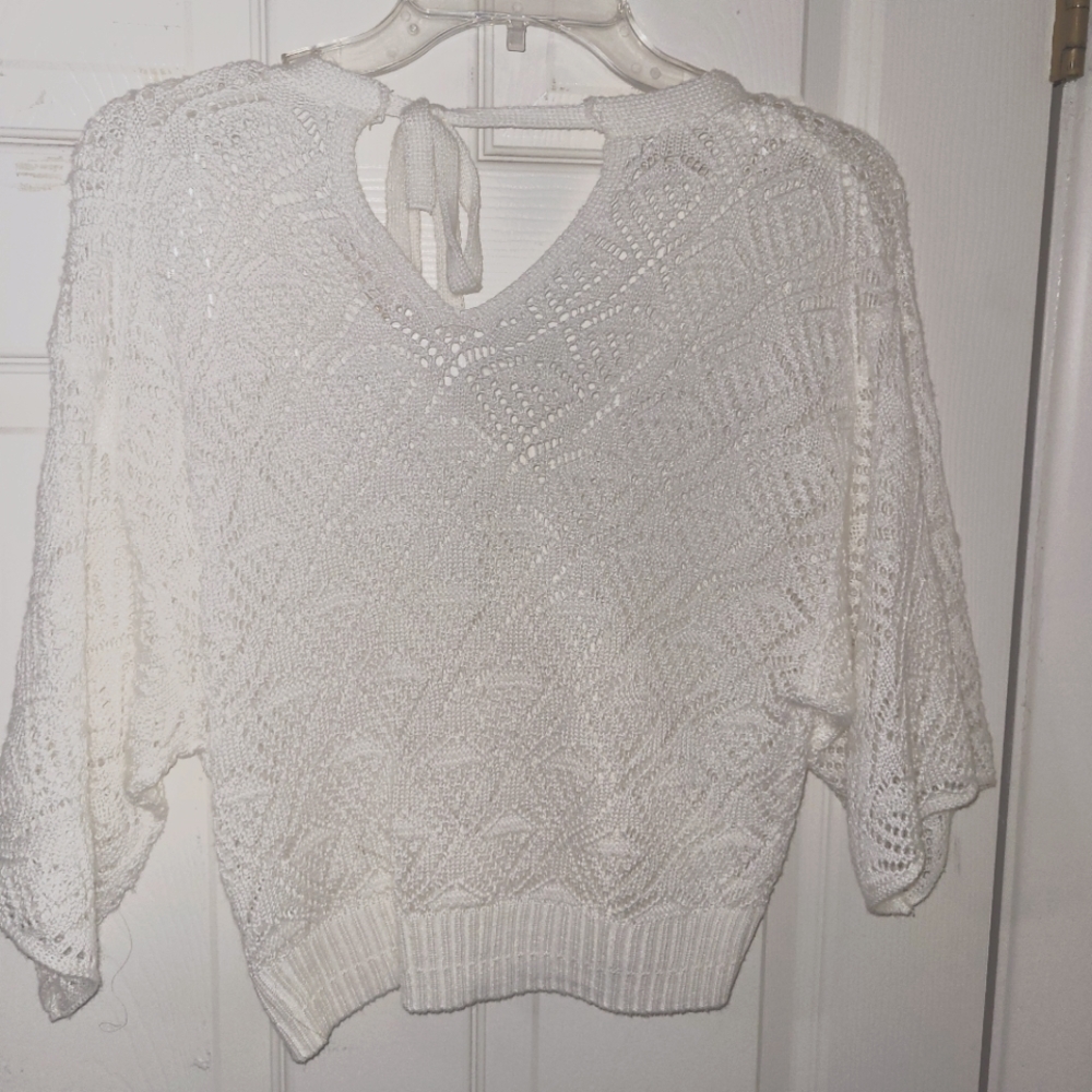 Cute summery crochet top.